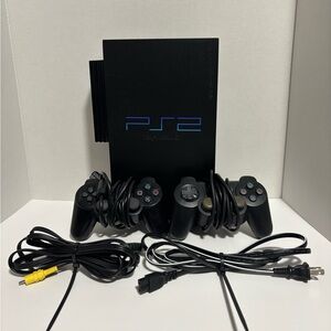 Ps2 console With 2 Controllers & 4 Games